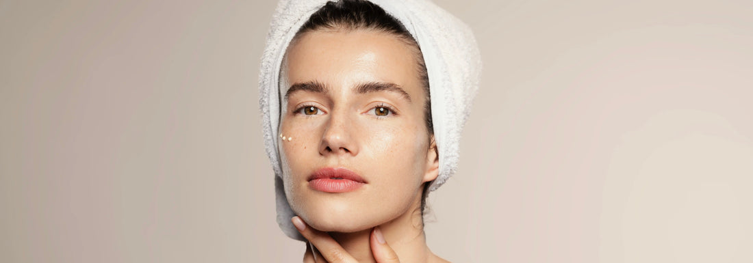 Woman applying moisturiser – Structural Skincare Support for Sensitive and Ageing Skin