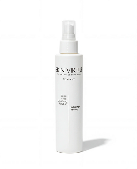White bottle of Skin Virtue Super Clear Clarifying Solution on a white background