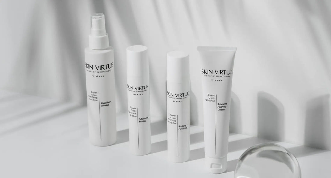 Skin Virtue Super Clear products with a glass sphere, representing a structured skincare routine for oily, combination, sensitive and blemish-prone skin.