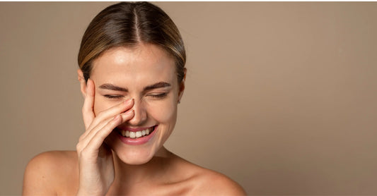 Model with Combination Skin hand against face laughing