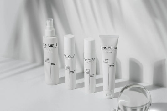 Skin Virtue  Super Clear Collection against grey back drop and leafy shadows