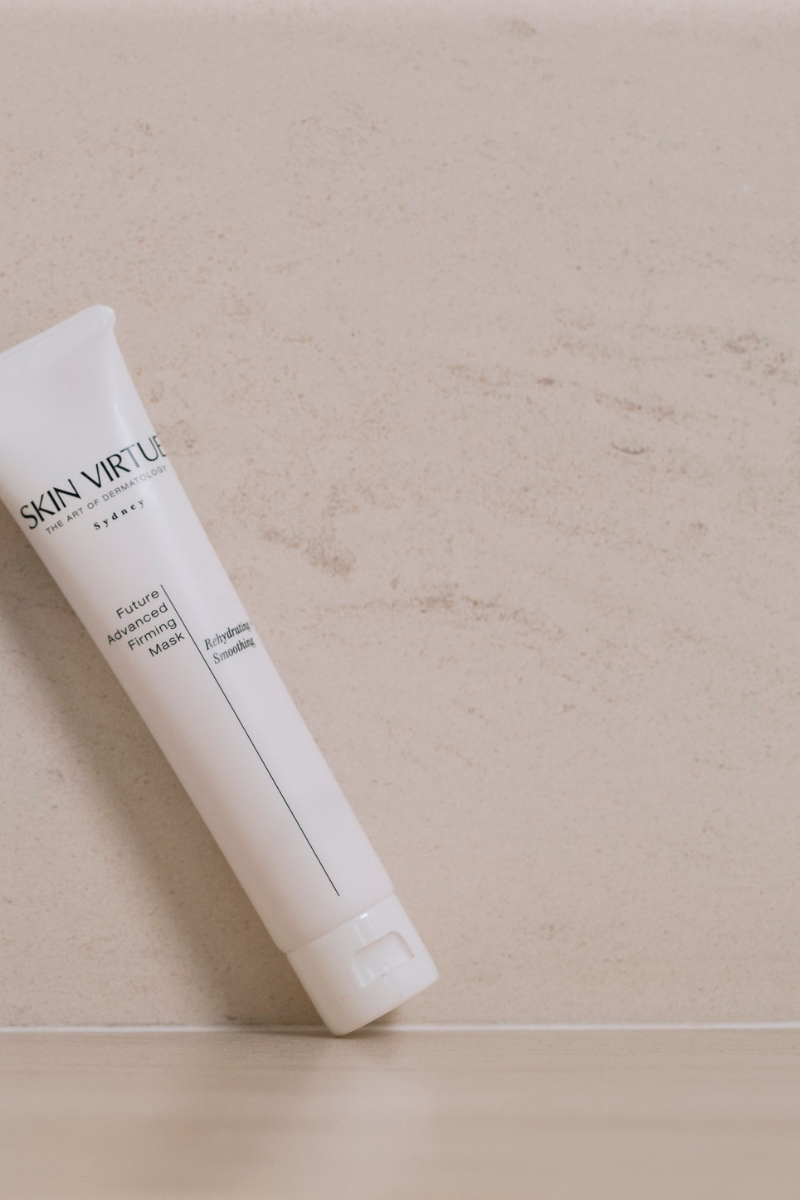  Skin Virtue Future Advanced Firming Mask skincare products on a beige background