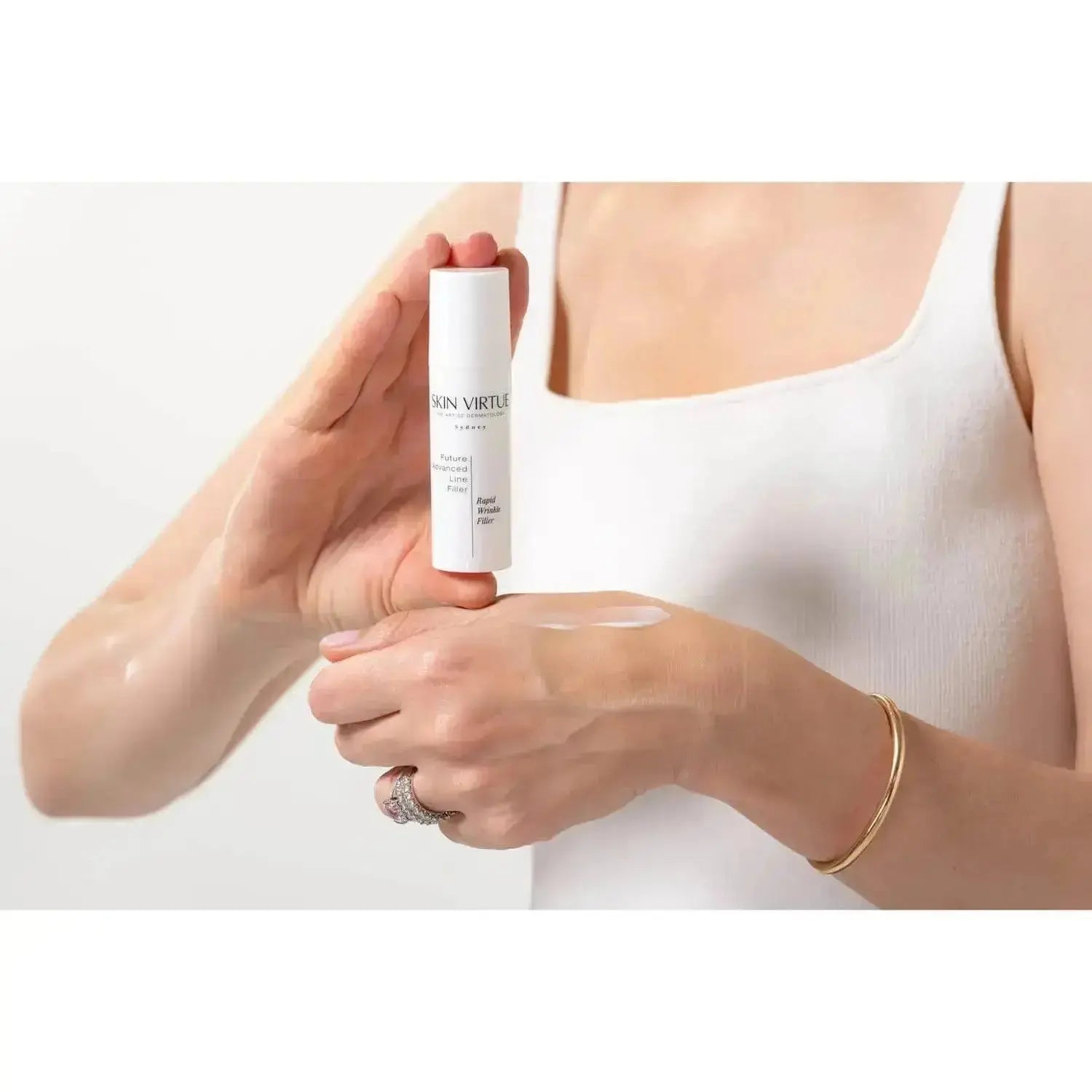 Future Advanced Line Filler - close up of model holding cream