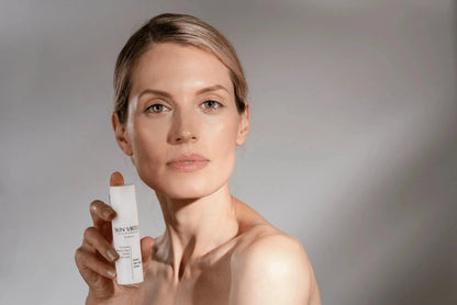 Post-Treatment Recovery & Repair model holding cream