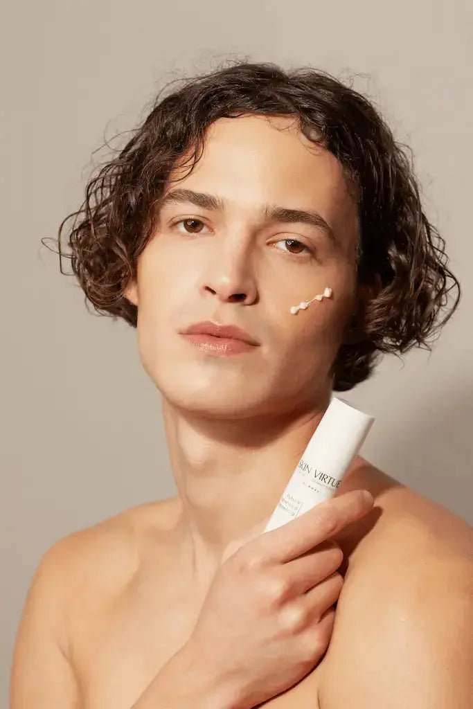 Male model holding Future Advanced Multi Active - Skin Virtue