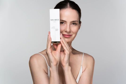 Nina holding the Future Advanced Serumist® - Skin Virtue