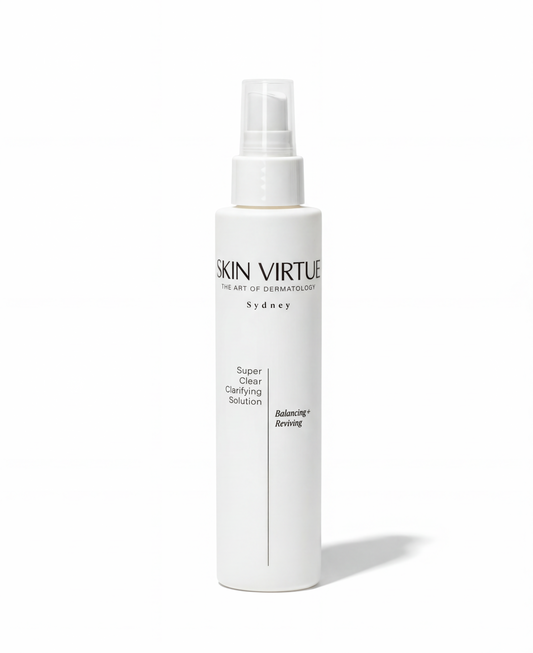 White bottle of Skin Virtue Super Clear Clarifying Solution on a white background