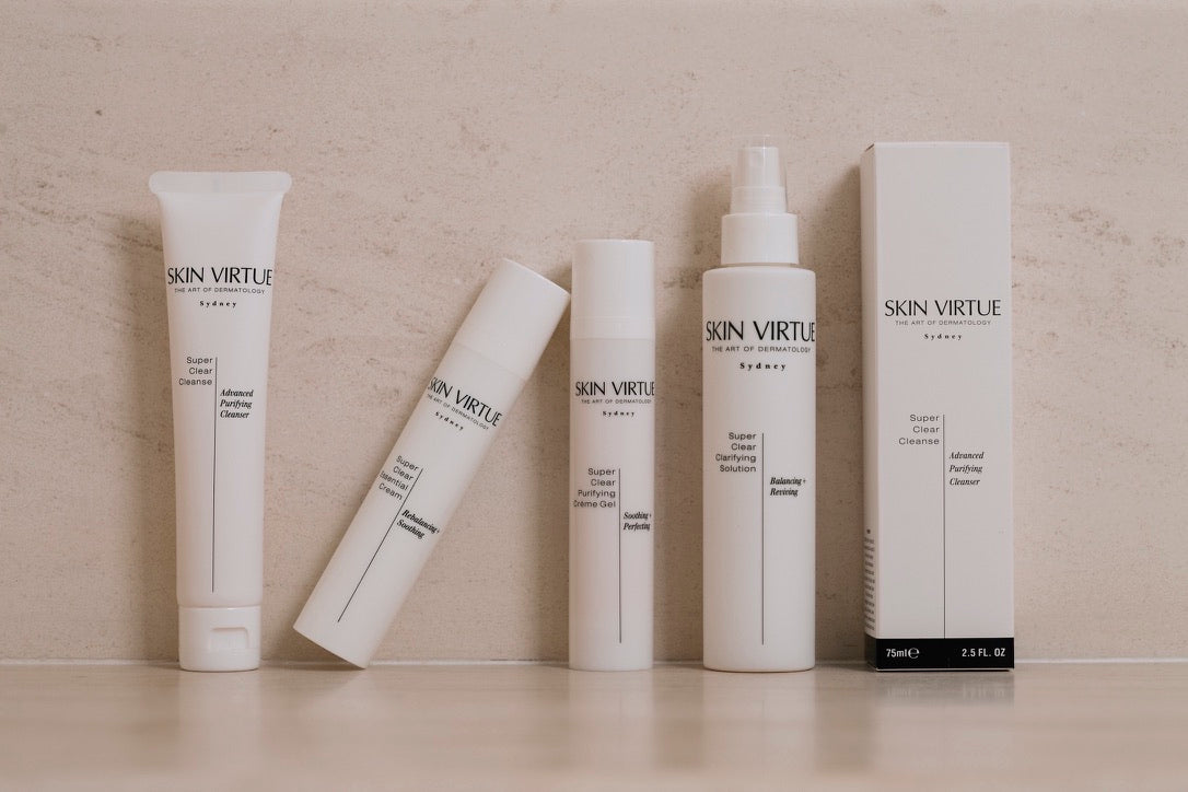 Super Clear Collection of Skin Virtue skincare products on a neutral background